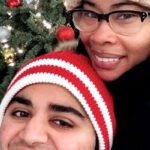 woman and man wearing knit hats