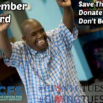 man with arms in the air